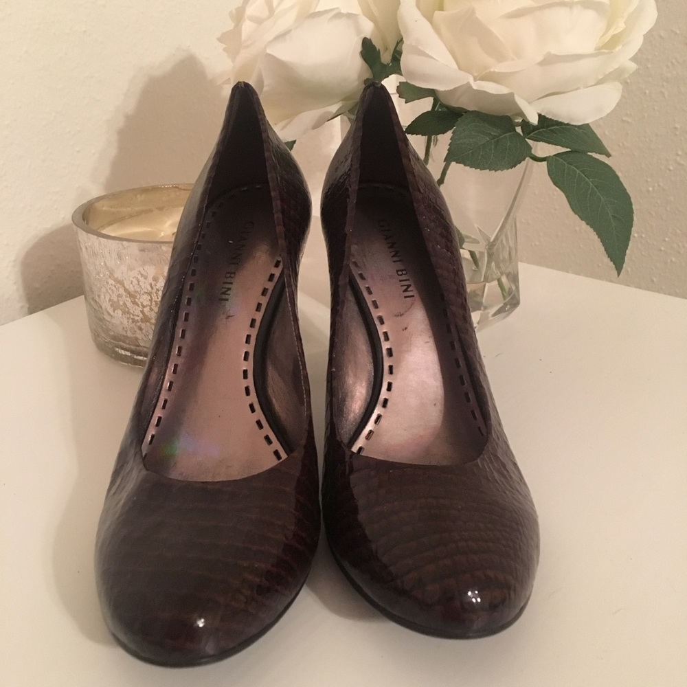 Dark brown patent leather, snake textured heels!